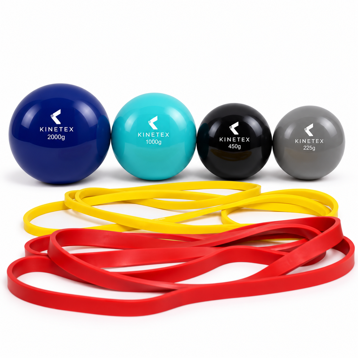 Kinetex weighted plyo balls (2000g, 1000g, 450g, 225g) with yellow and red resistance bands